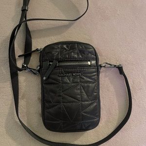 Michael kors crossbody bag small in black quilt. Great condition!